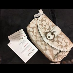Authentic coach wristlet/clutch